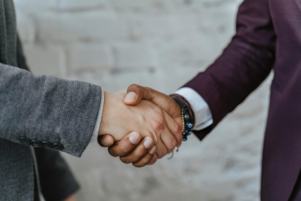 two men shaking hands